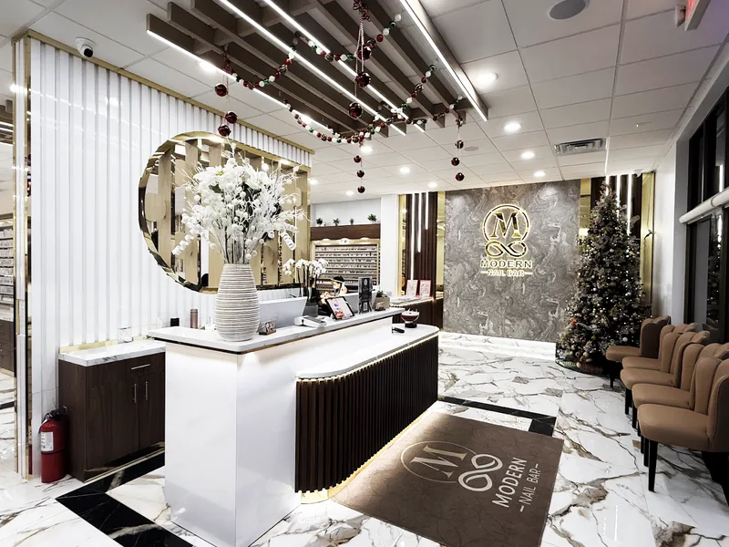 Reception desk and waiting area of a nail salon running D3